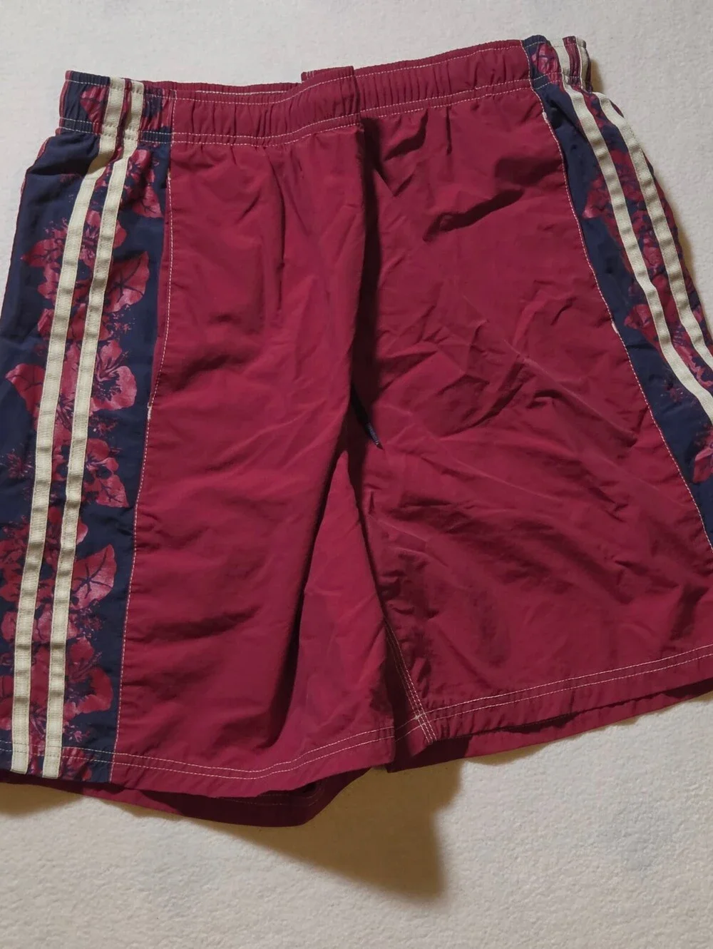 Tommy Hilfiger burgundy swim trunks with side stripe